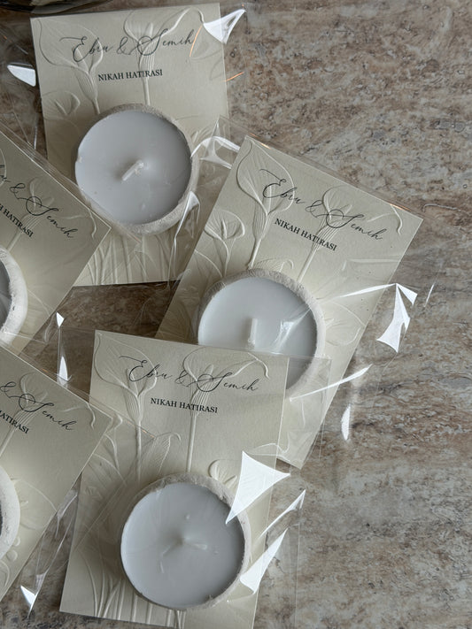 Personalisierte Gastgeschenke - handgeformte Teelichter mit Struktur Papier